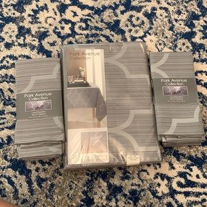 Brand new Park Avenue Gray table cloth and matching napkins 60” x 84”